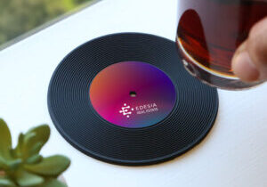 branded coaster in the shape of a vintage record
